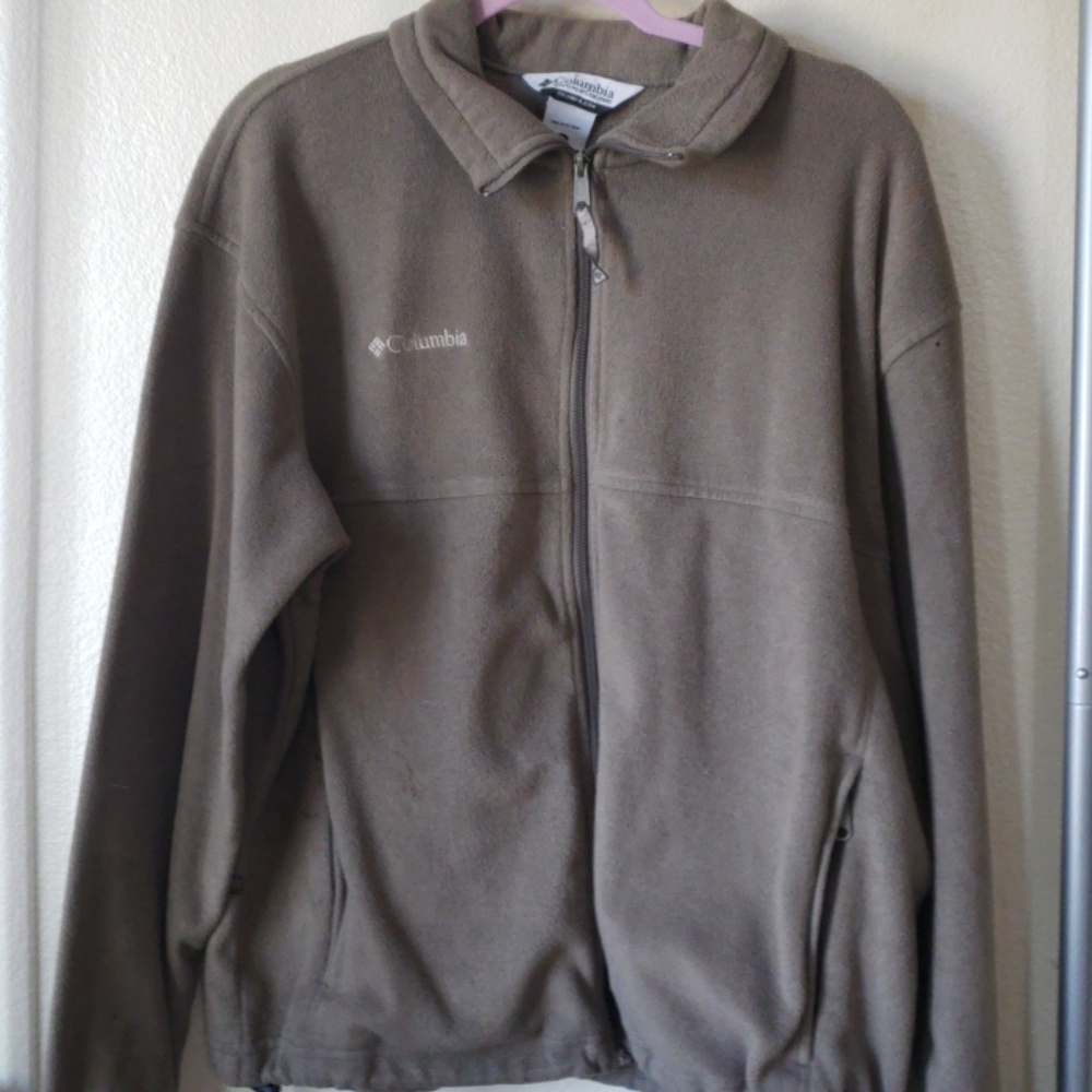 a mens brown zip up coat